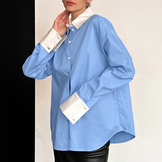 Blue long sleeve women's casual shirt with white cuffs