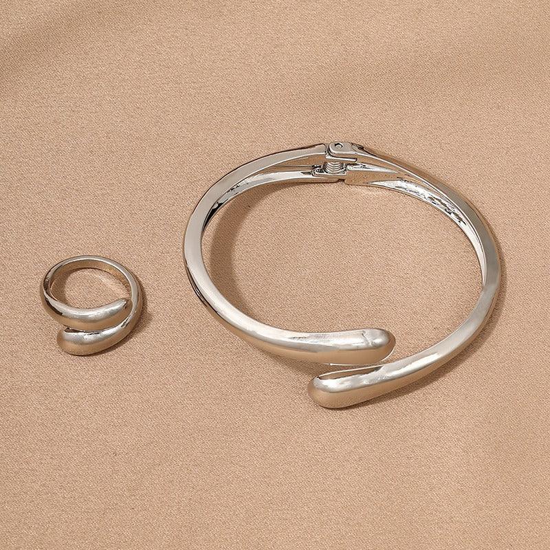 Simple metal temperament geometric circular smooth surface women - Johns Direct