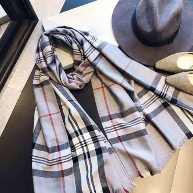 Soft warm stylish checked fashion scarf on display